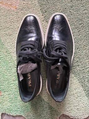 Prada Black Leather Brogue-Style Ankle Boots with White Trim